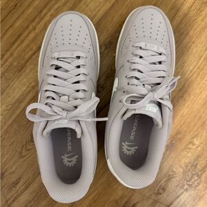 Nike Gray and Purple Sneakers with Perforated Design